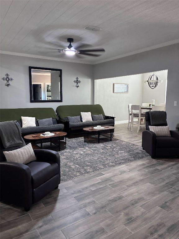 1135 Red Fox Road La Grange, TX 78945 - Photo 11 of 32 a living room with furniture and a wooden floor
