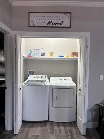 a utility room with dryer and washer