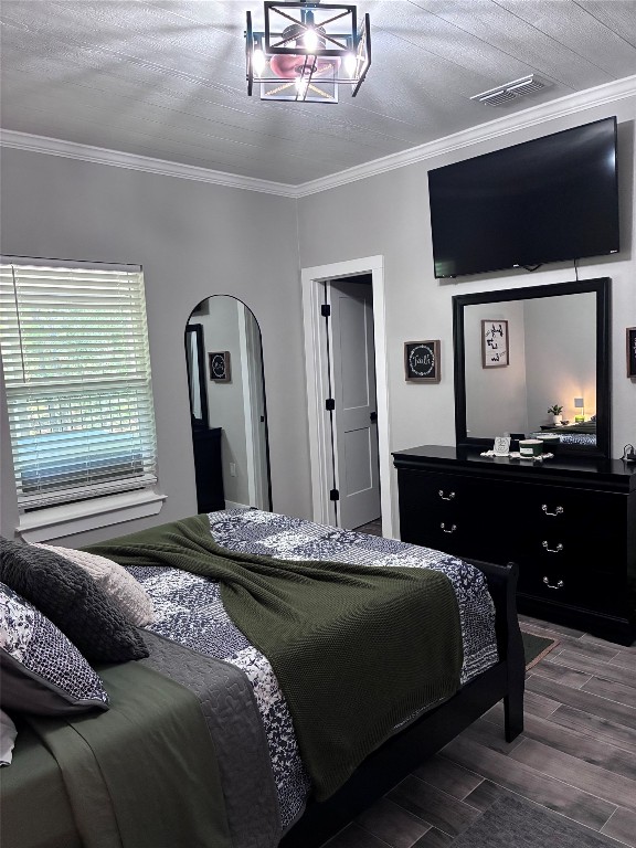 1135 Red Fox Road La Grange, TX 78945 - Photo 19 of 32 a bedroom with a bed and a flat screen tv