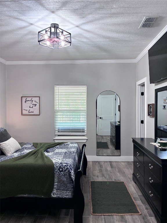 1135 Red Fox Road La Grange, TX 78945 - Photo 20 of 32 a bedroom with a bed and a flat screen tv