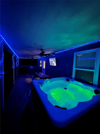 a view of a room with a swimming pool