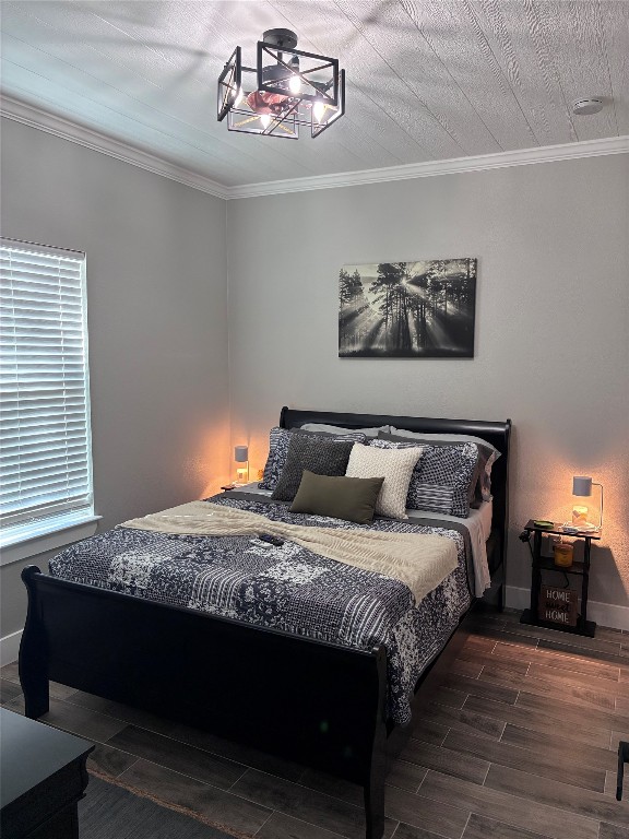 1135 Red Fox Road La Grange, TX 78945 - Photo 25 of 32 2nd Bedroom featuring ornamental molding and wood tiled floors