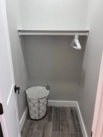 a view of wooden floor in a bathroom