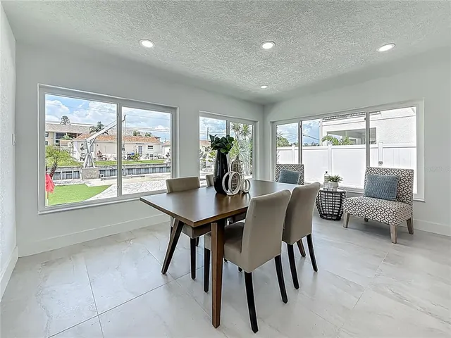 a view of an empty room with a closet