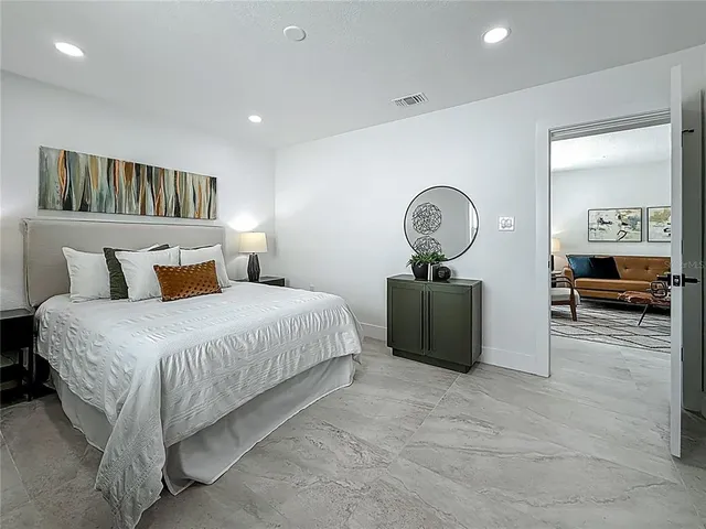 a view of a patio with a table and chairs