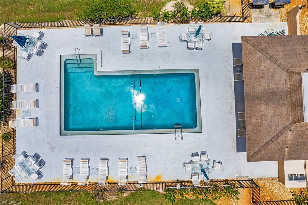 a aerial view of a house with a swimming pool