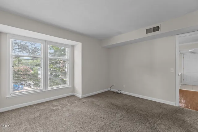 $310,000 | 1011 Nicholwood Drive, Unit 209, Raleigh, NC 27605