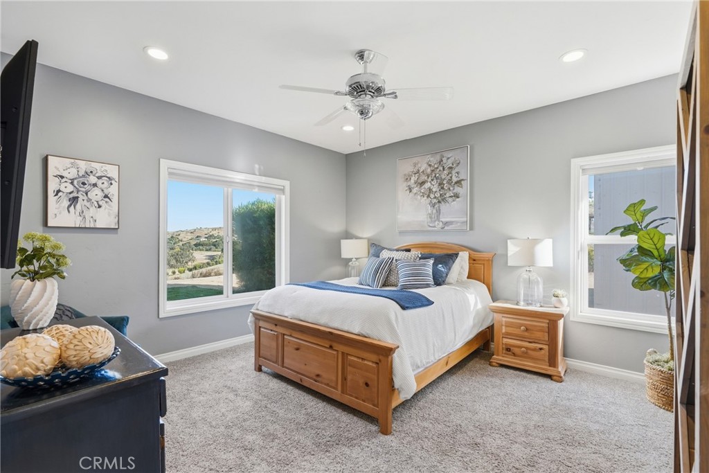 220 Cook Court Templeton, CA 93465 - Photo 25 of 45 a spacious bedroom with a bed and window