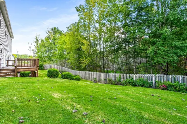 a view of a backyard with a garden