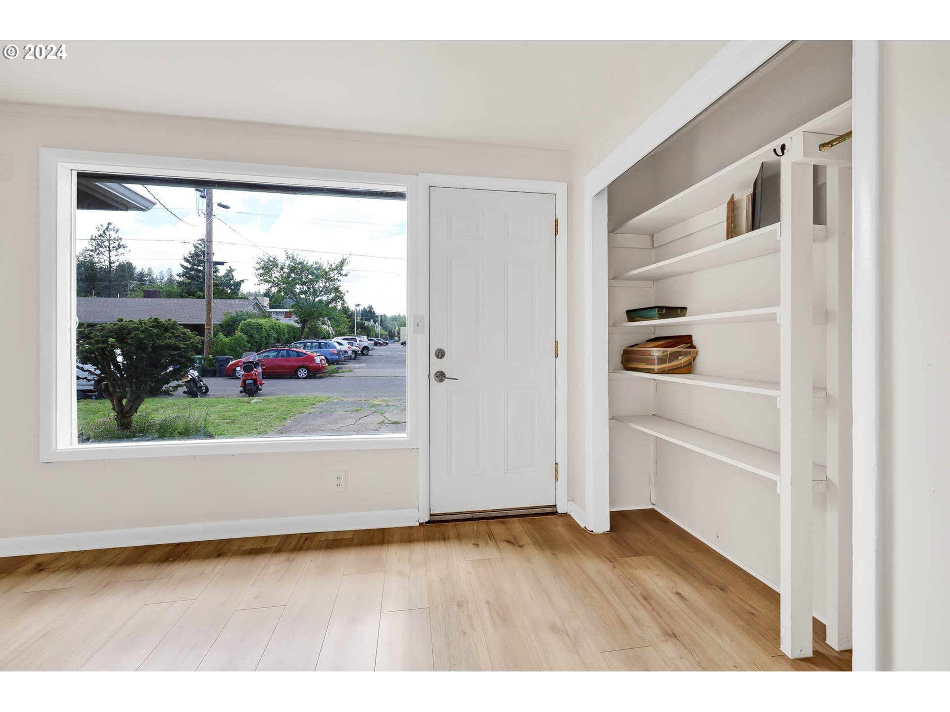 2915-2925 Oak Street Eugene, OR 97405 - Photo 5 of 42 a view interior of a house with wooden floor and windows