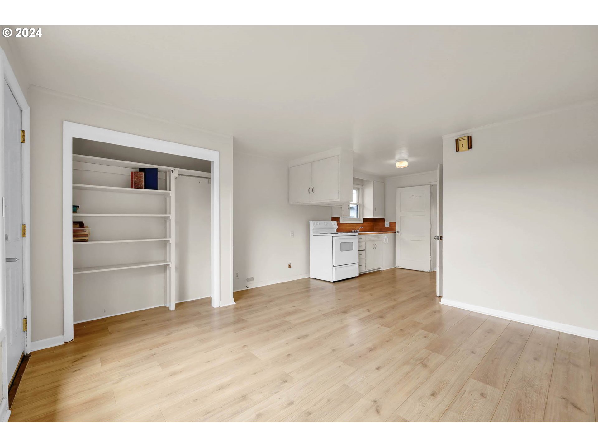 2915-2925 Oak Street Eugene, OR 97405 - Photo 6 of 42 a view of kitchen and wooden floor