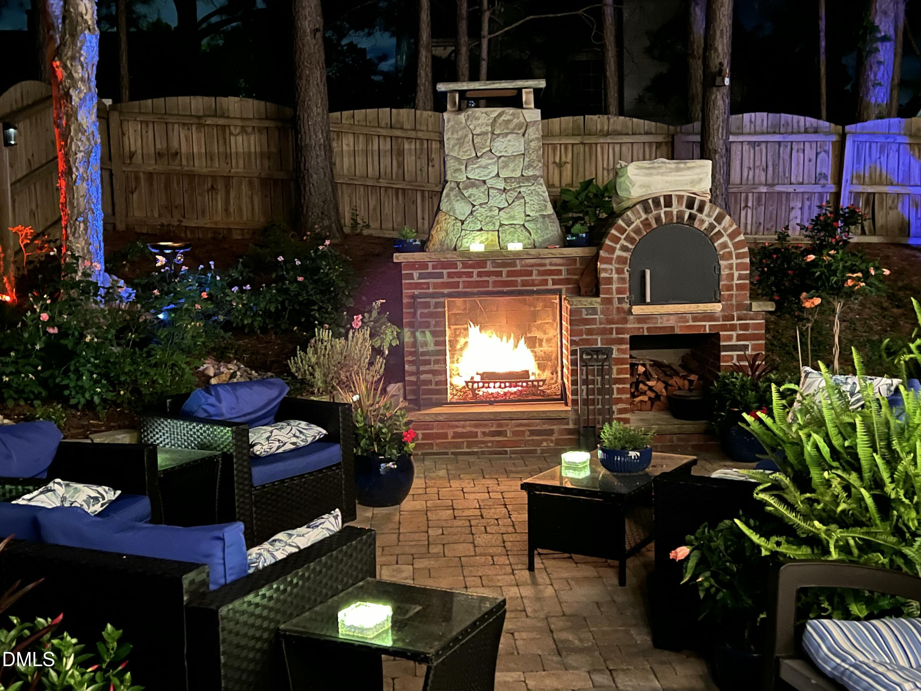 309 Firefly Road Holly Springs, NC 27540 - Photo 13 of 44 Fireplace at night