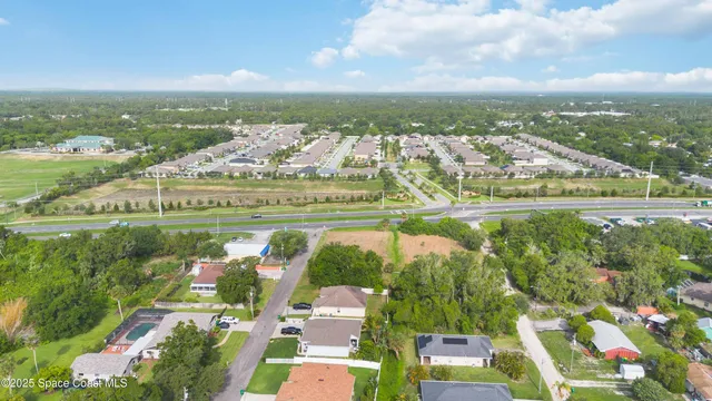 a view of a city with an ocean view