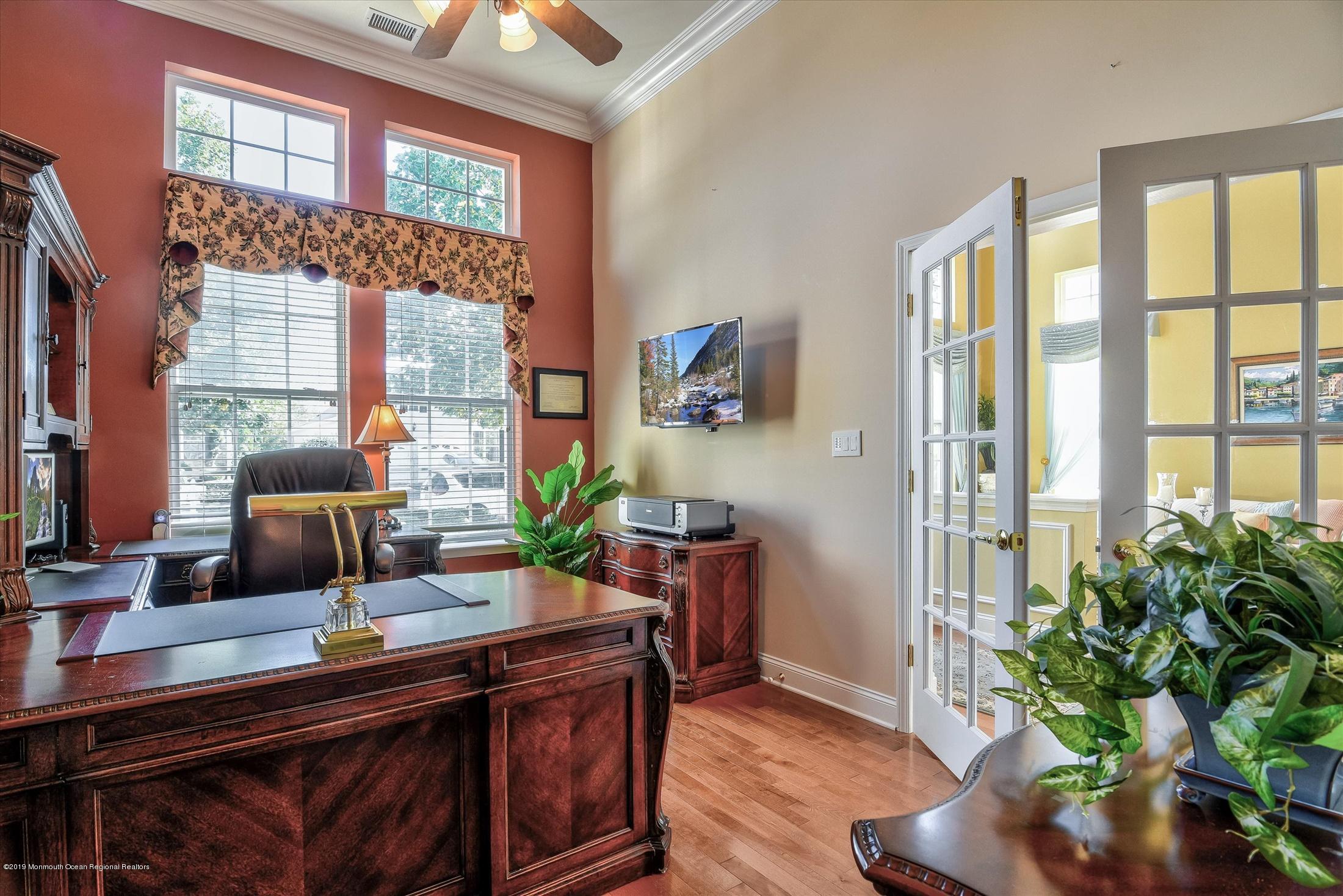 47 Portchester Drive Jackson, NJ 08527 - Photo 11 of 46 a living room with furniture and a potted plant