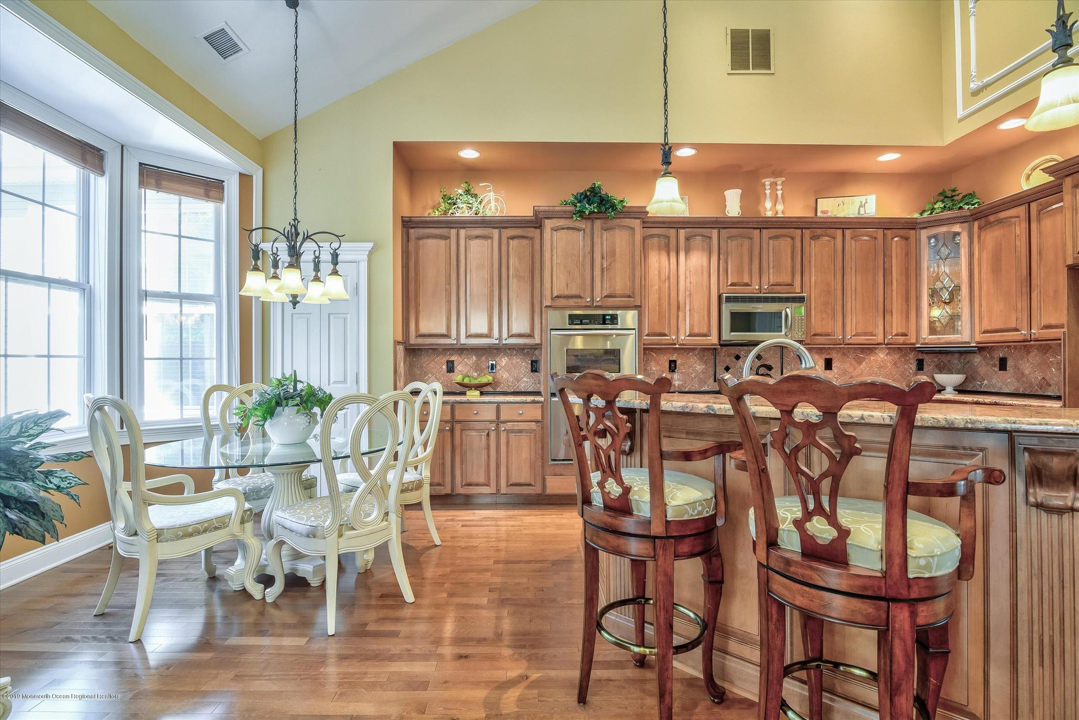 47 Portchester Drive Jackson, NJ 08527 - Photo 14 of 46 a view of a dining room with furniture window and outside view