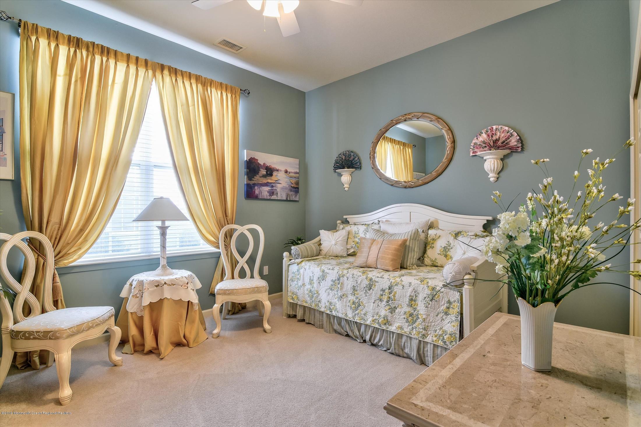 47 Portchester Drive Jackson, NJ 08527 - Photo 26 of 46 a living room with furniture and a large window