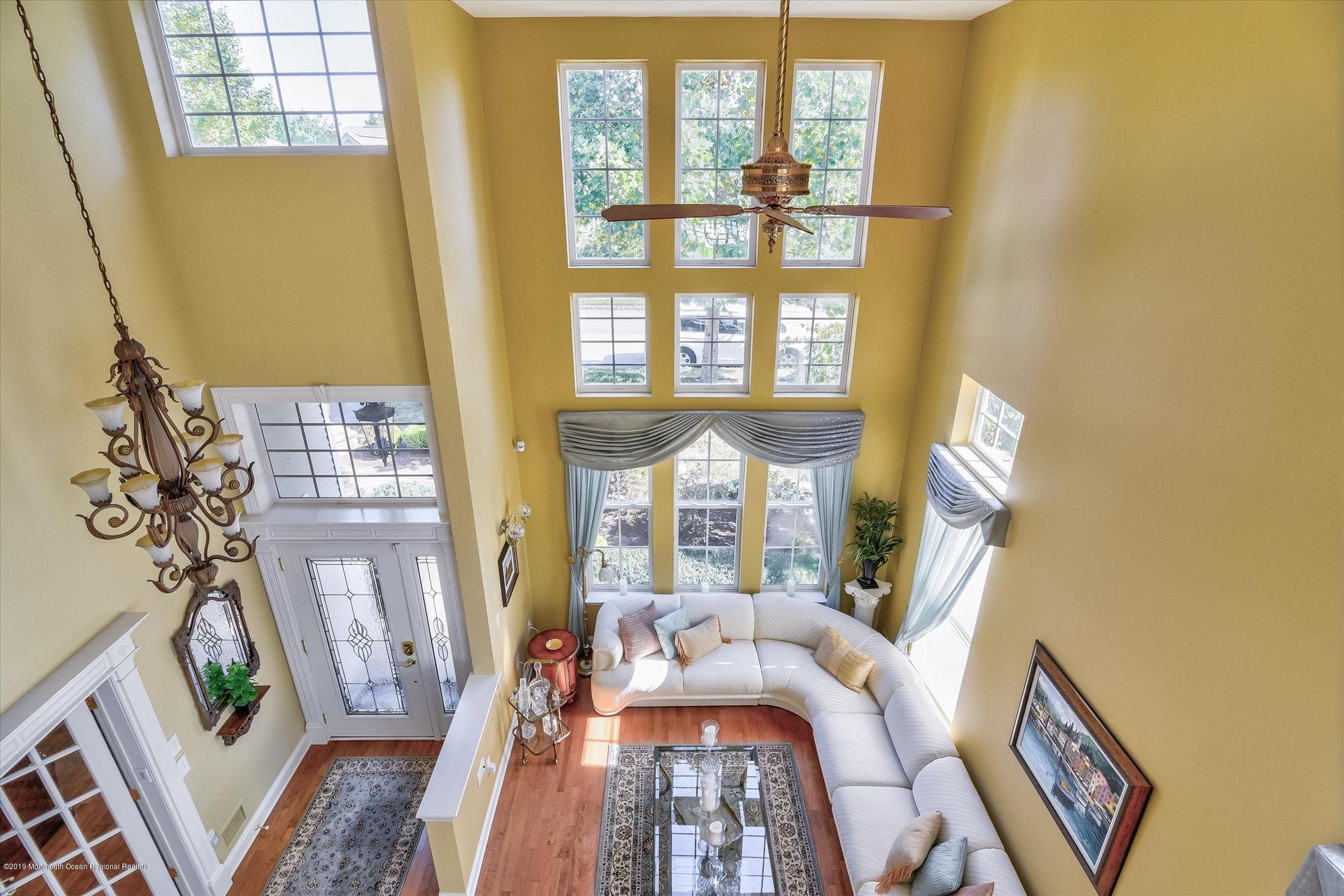 47 Portchester Drive Jackson, NJ 08527 - Photo 8 of 46 a living room with furniture and a window