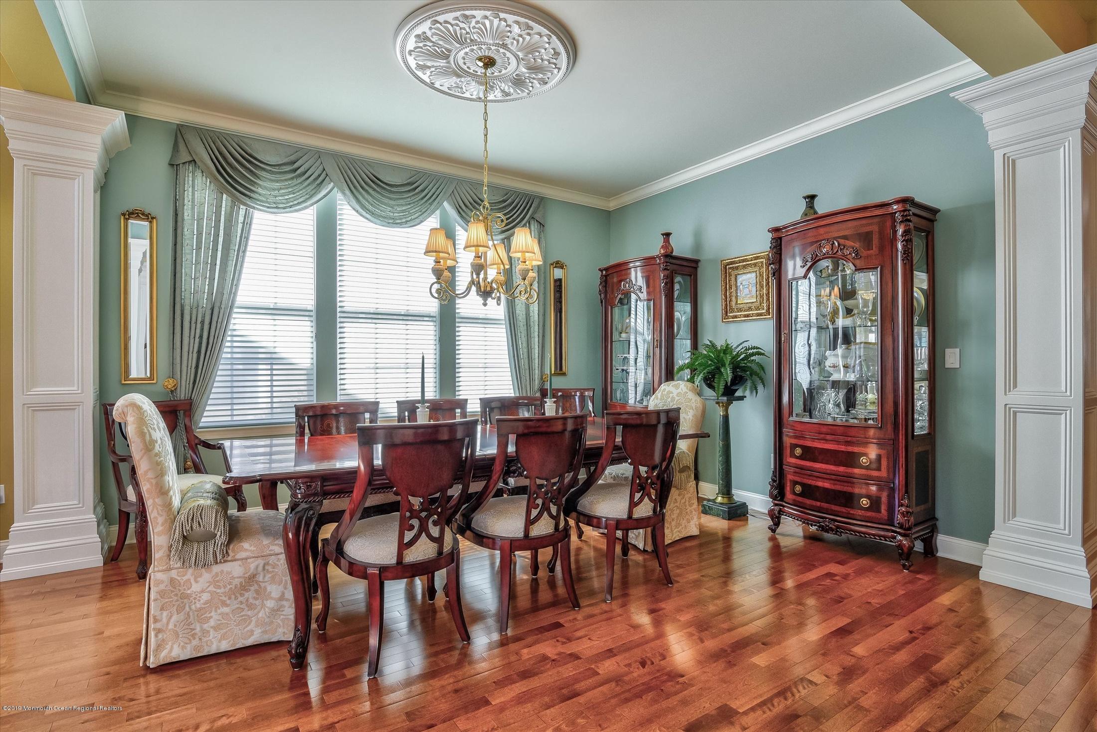 47 Portchester Drive Jackson, NJ 08527 - Photo 10 of 46 a view of a dining room with furniture window and wooden floor