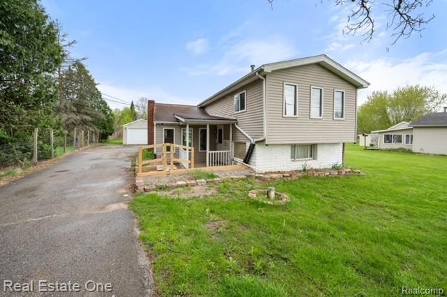 11099 North Irish Road Otisville, MI 48463 - Photo 1 of 23 front house 2.jpeg