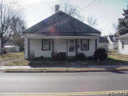 2206 West City Point Road Hopewell, VA 23860 - Photo 1 of 6 a front view of a house with garage