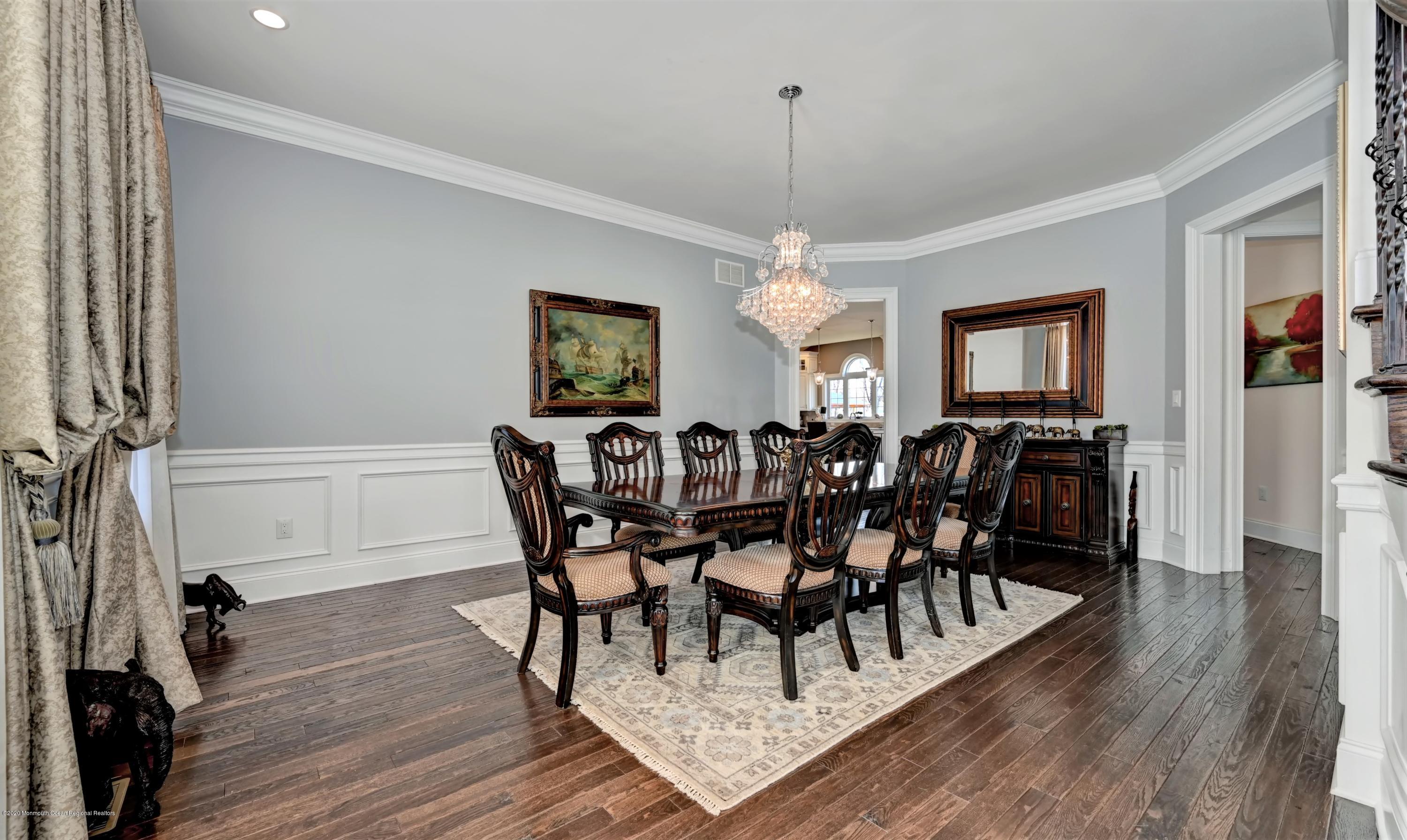 15 Windermere Road Lincroft, NJ 07738 - Photo 15 of 56 a view of a dining room with furniture window and wooden floor