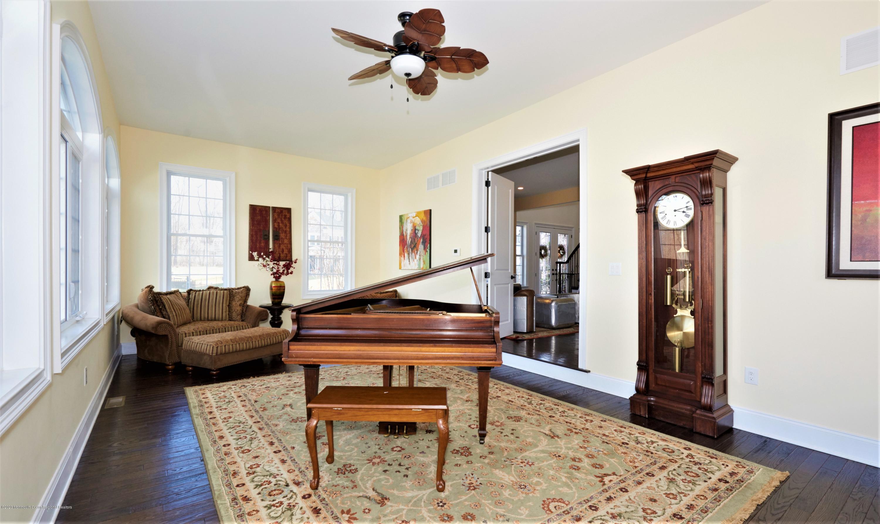15 Windermere Road Lincroft, NJ 07738 - Photo 18 of 56 a living room with furniture and wooden floor