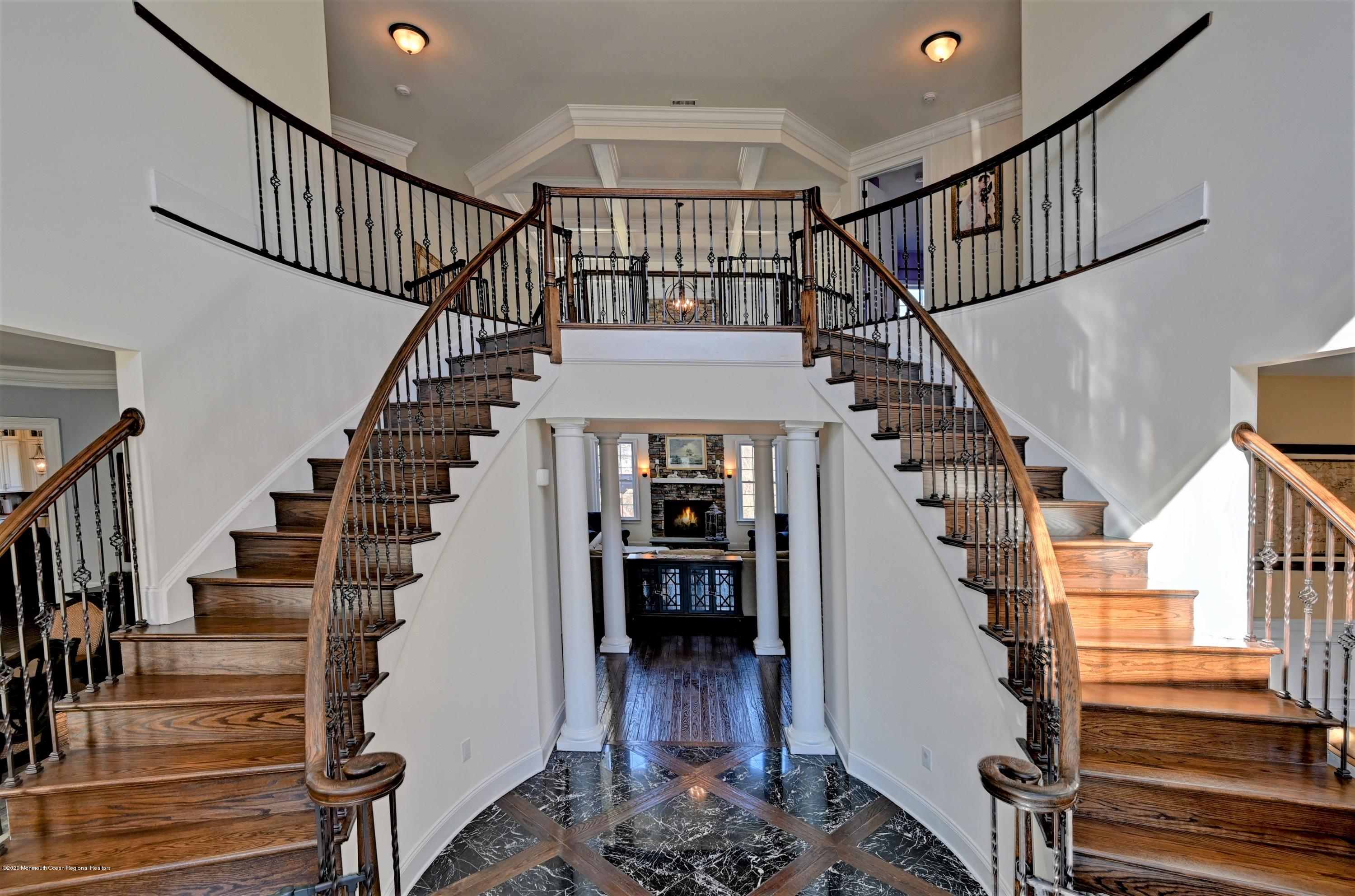 15 Windermere Road Lincroft, NJ 07738 - Photo 3 of 56 a view of entryway and hall with wooden floor