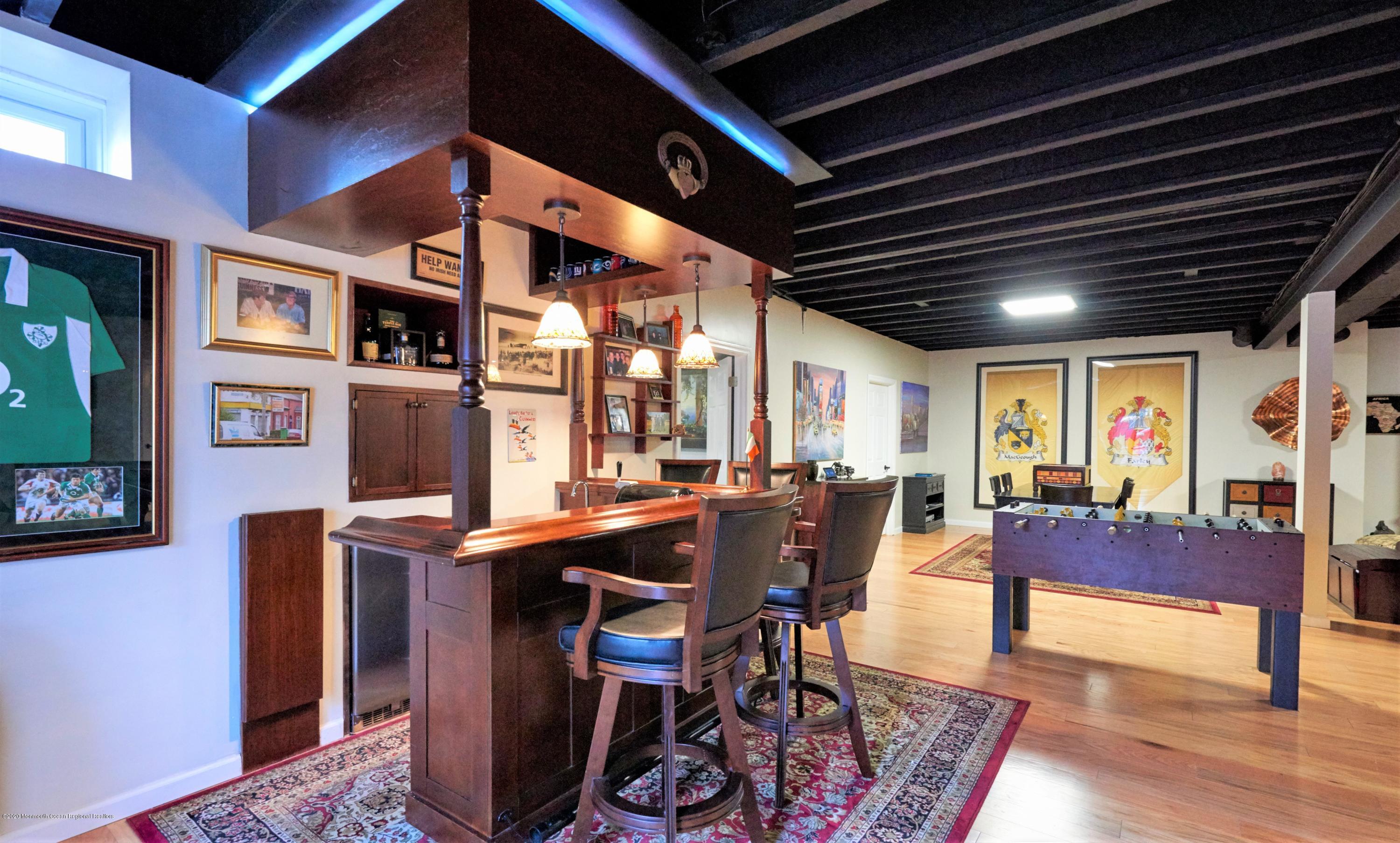 15 Windermere Road Lincroft, NJ 07738 - Photo 35 of 56 a view of a dining room with furniture