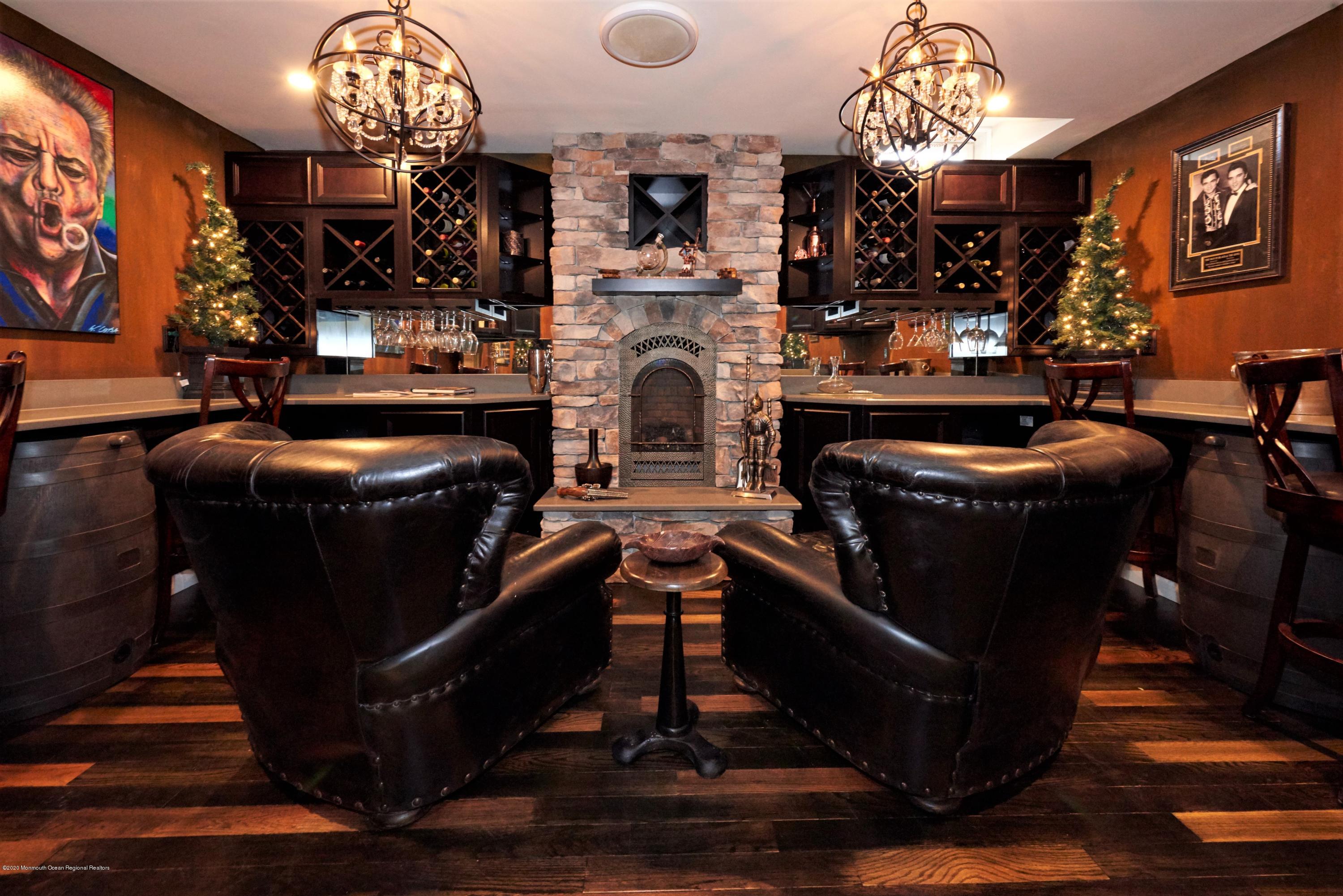 15 Windermere Road Lincroft, NJ 07738 - Photo 37 of 56 a kitchen with lots of appliances and wooden floor