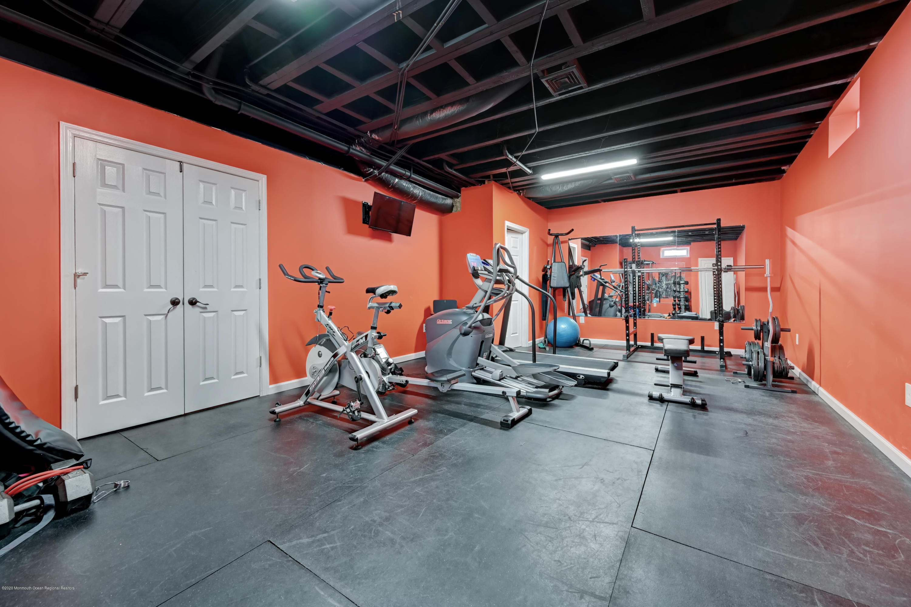 15 Windermere Road Lincroft, NJ 07738 - Photo 42 of 56 a view of a room with gym equipment