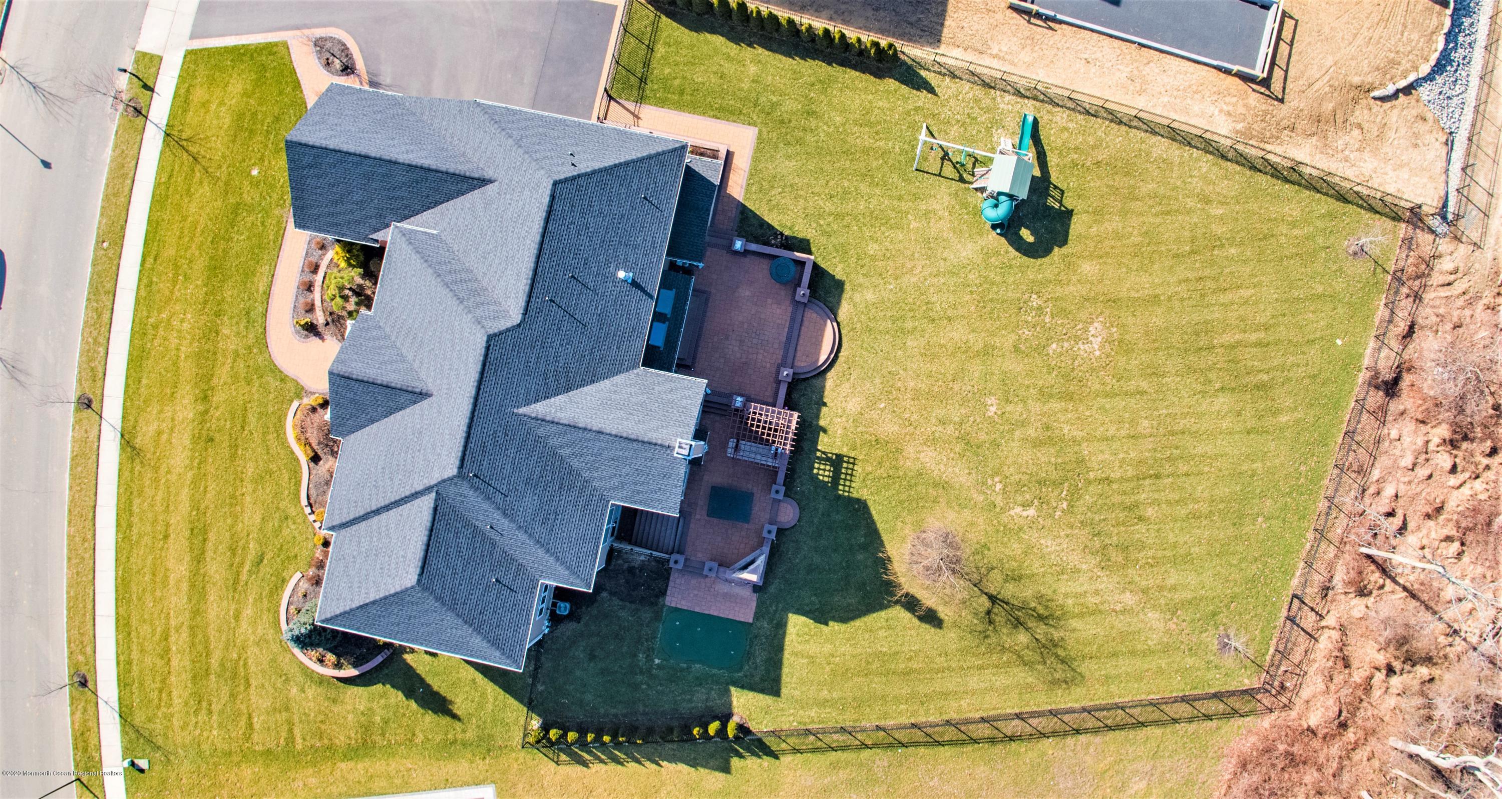 15 Windermere Road Lincroft, NJ 07738 - Photo 53 of 56 a view of a swimming pool