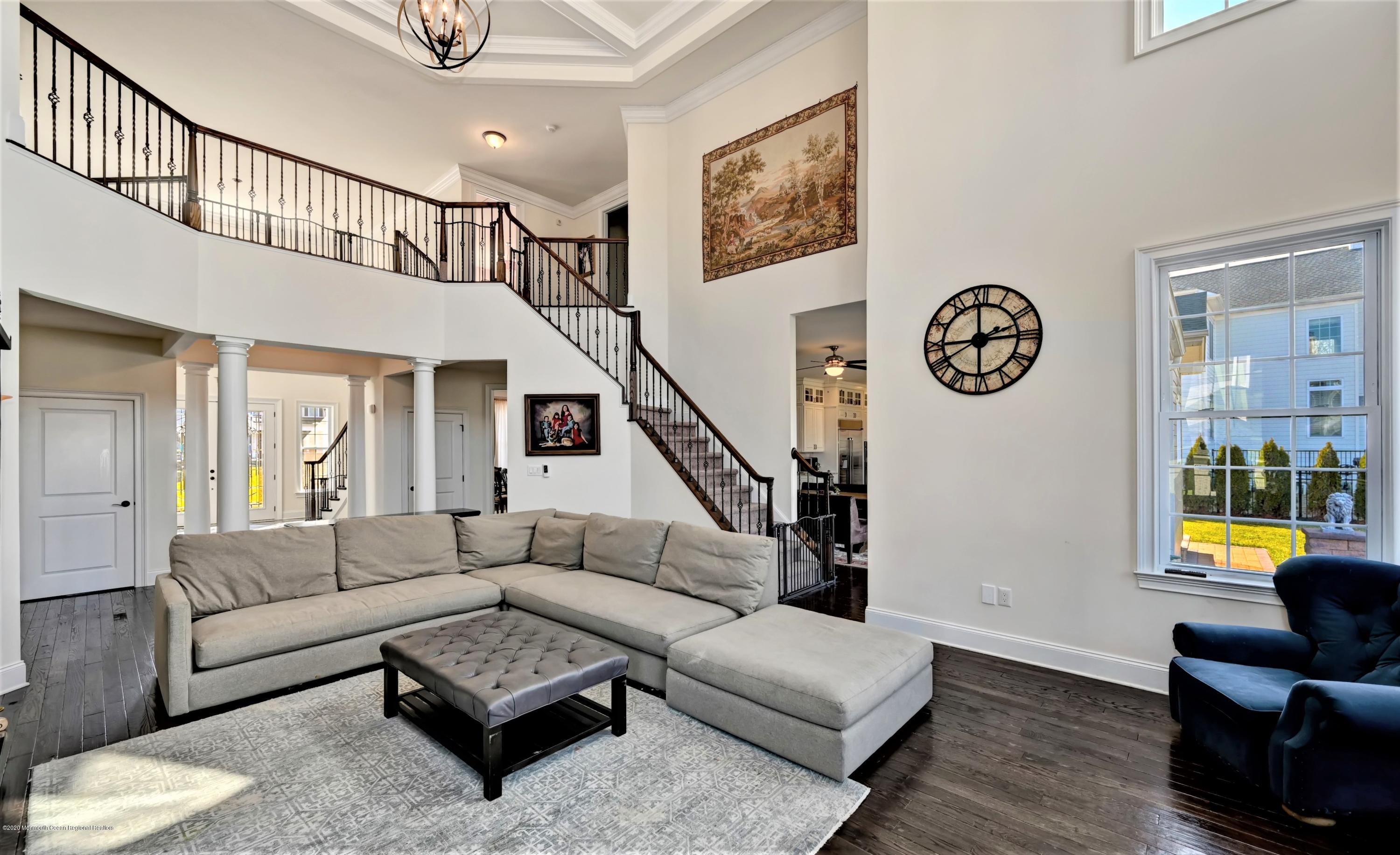 15 Windermere Road Lincroft, NJ 07738 - Photo 7 of 56 a living room with furniture and a window