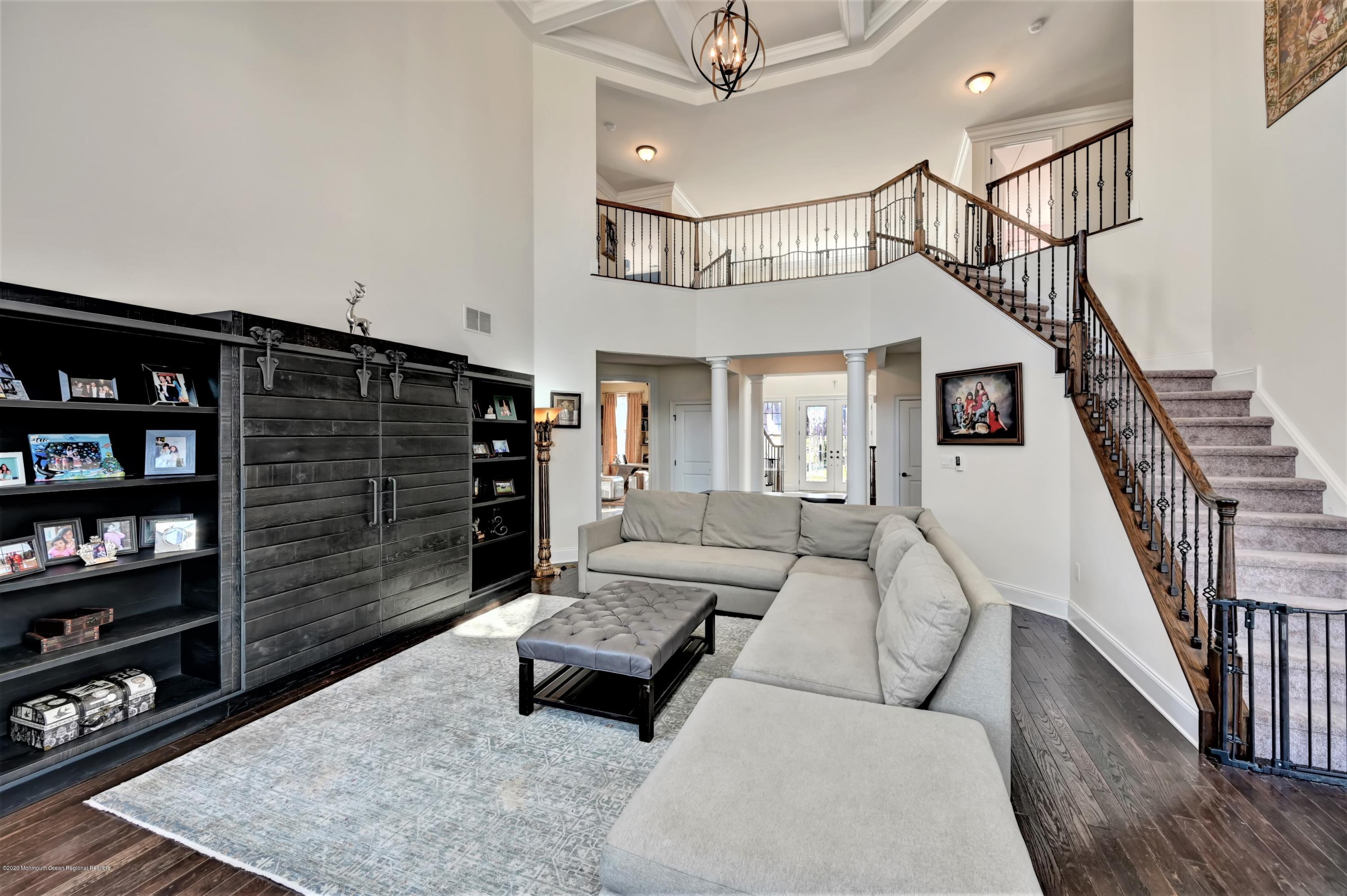 15 Windermere Road Lincroft, NJ 07738 - Photo 8 of 56 a living room with furniture and wooden floor