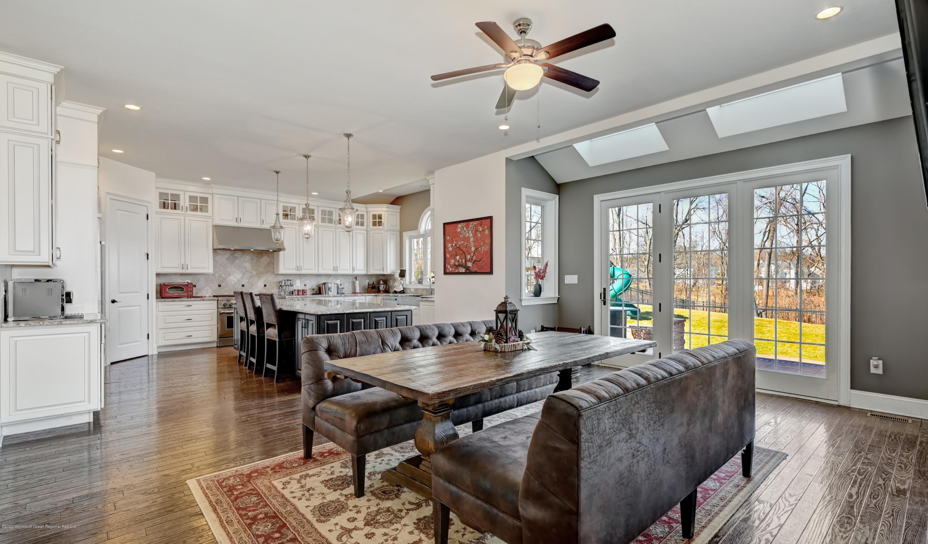 15 Windermere Road Lincroft, NJ 07738 - Photo 9 of 56 a view of a dining room with furniture window and wooden floor