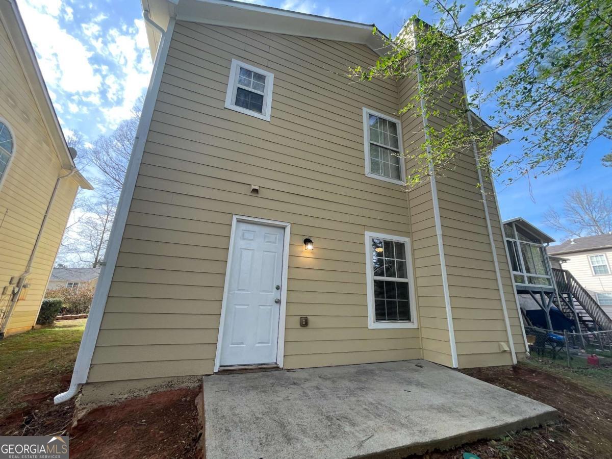 1374 To Lani Farm Road Stone Mountain, GA 30083 - Photo 17 of 18 a view of house
