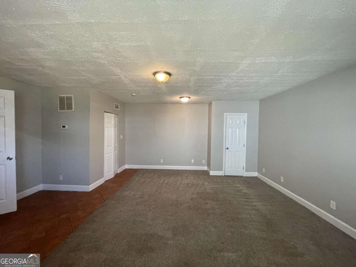 1374 To Lani Farm Road Stone Mountain, GA 30083 - Photo 5 of 18 a view of an empty room