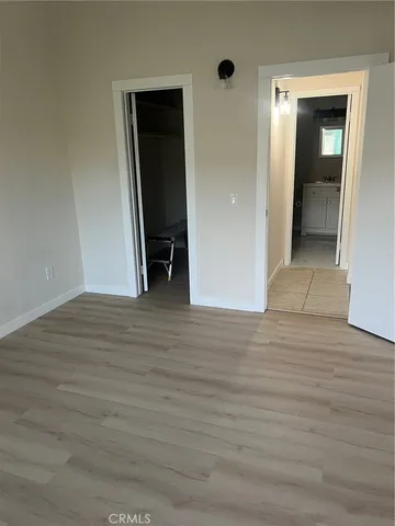 wooden floor and closet in a room