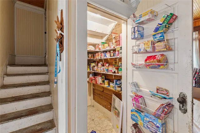 a storage room with washer and dryer