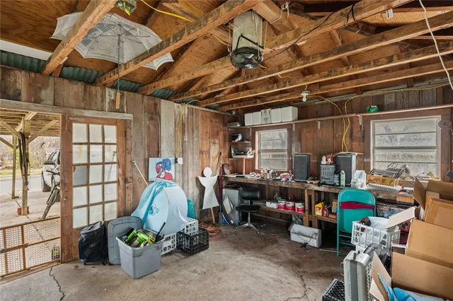 a front view of house with yard and trees