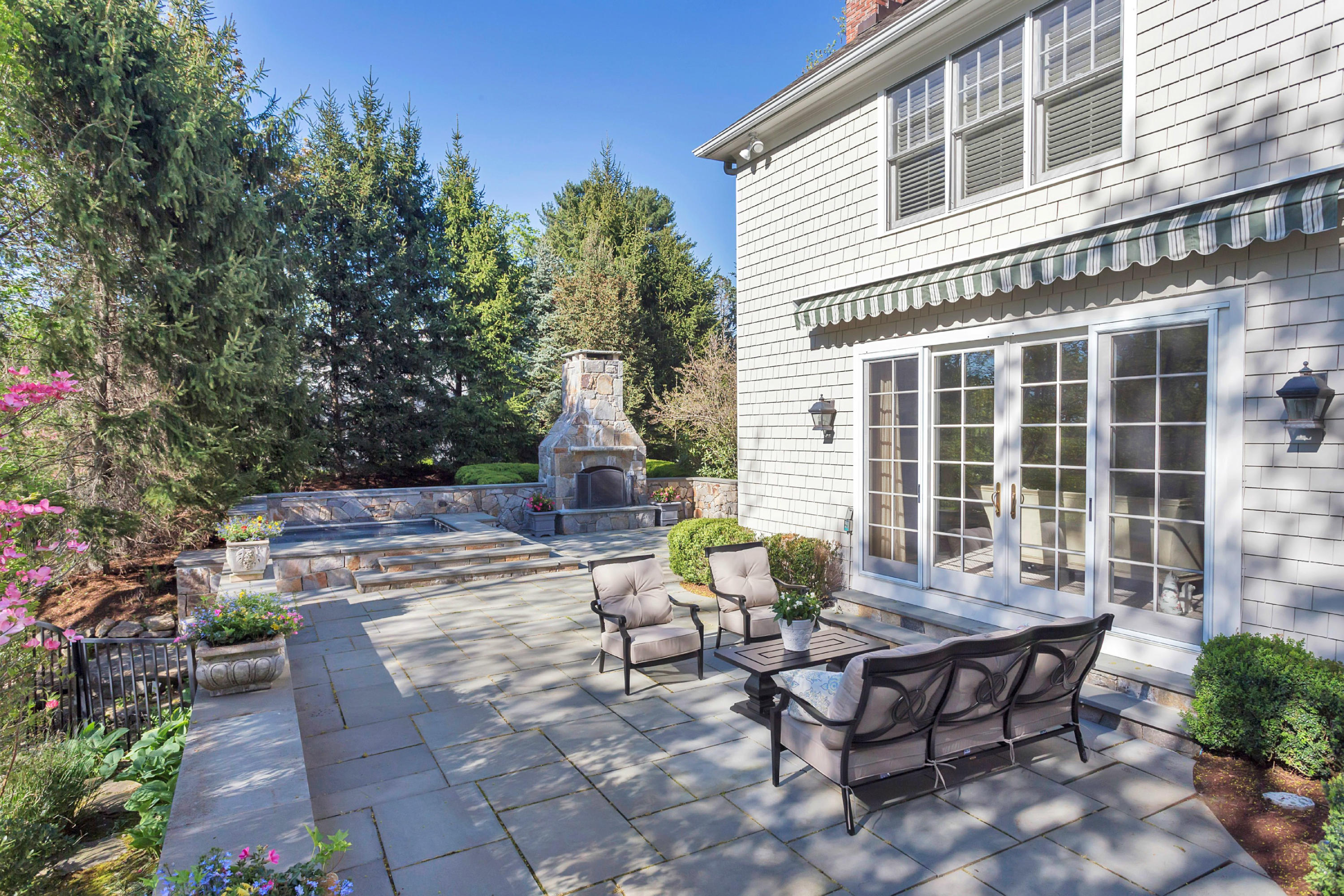 7 Juniper Road Darien, CT 06820 - Photo 22 of 25 a view of a backyard with sitting area