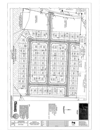 a black and white photo of a living room