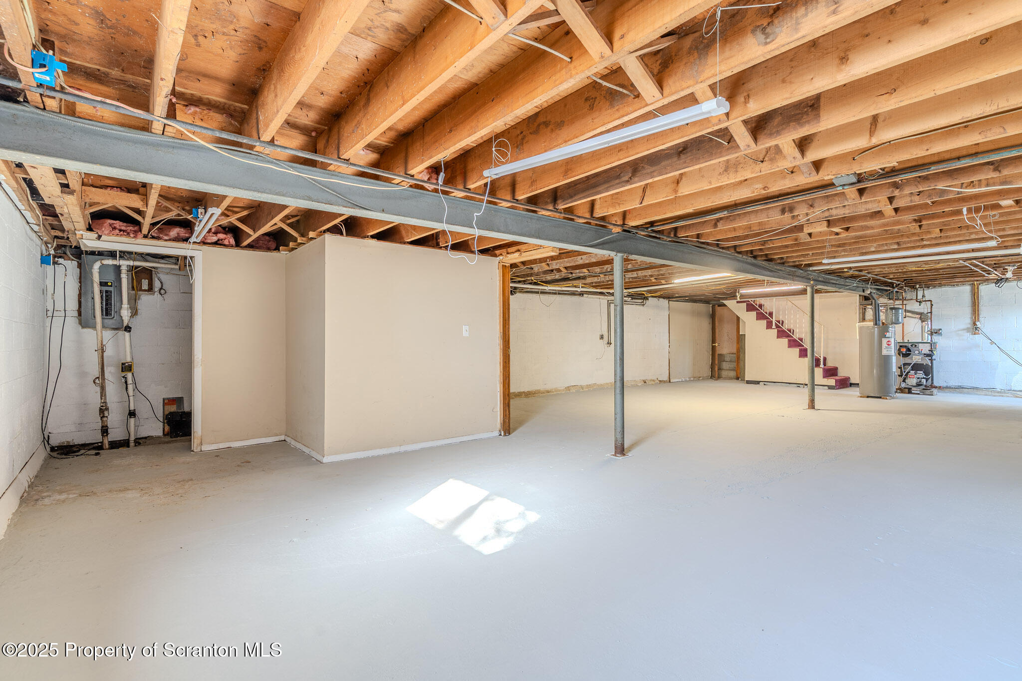 101 Sunset Road Dalton, PA 18414 - Photo 26 of 37 a view of empty room with wooden walls