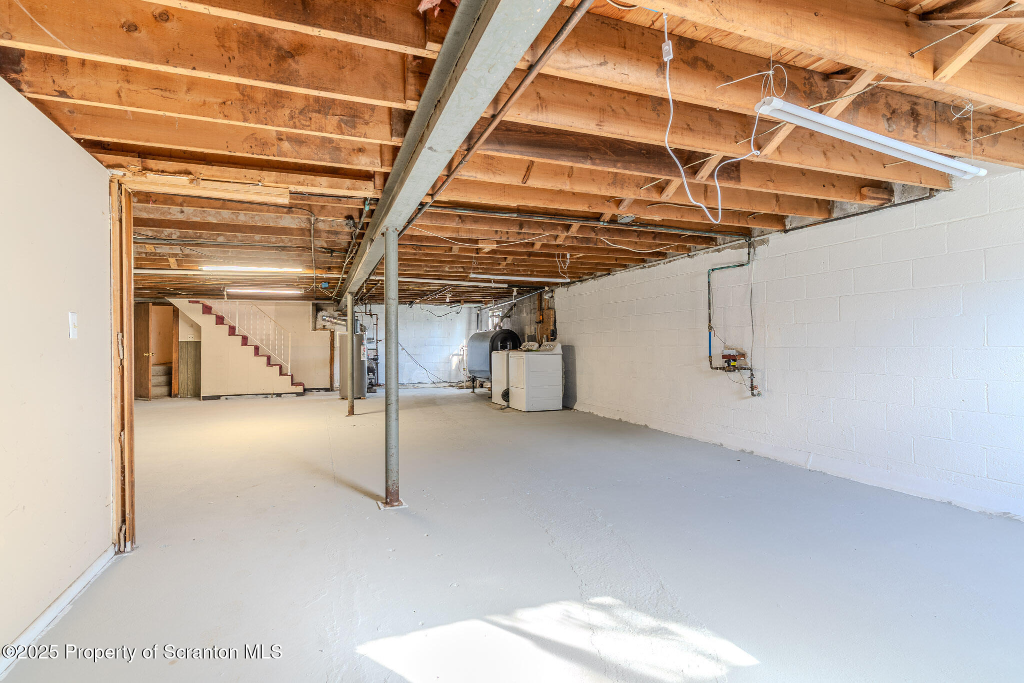 101 Sunset Road Dalton, PA 18414 - Photo 27 of 37 a view of a room with wooden walls
