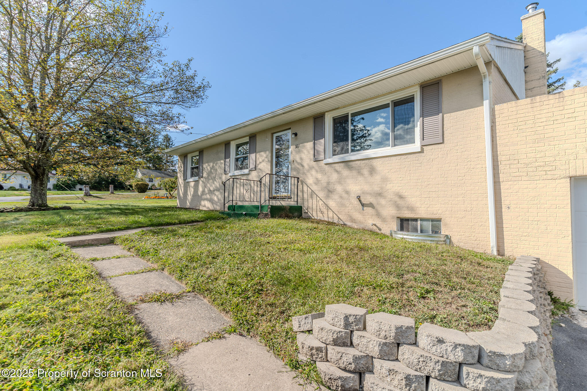 101 Sunset Road Dalton, PA 18414 - Photo 5 of 37 a view of a house with a yard