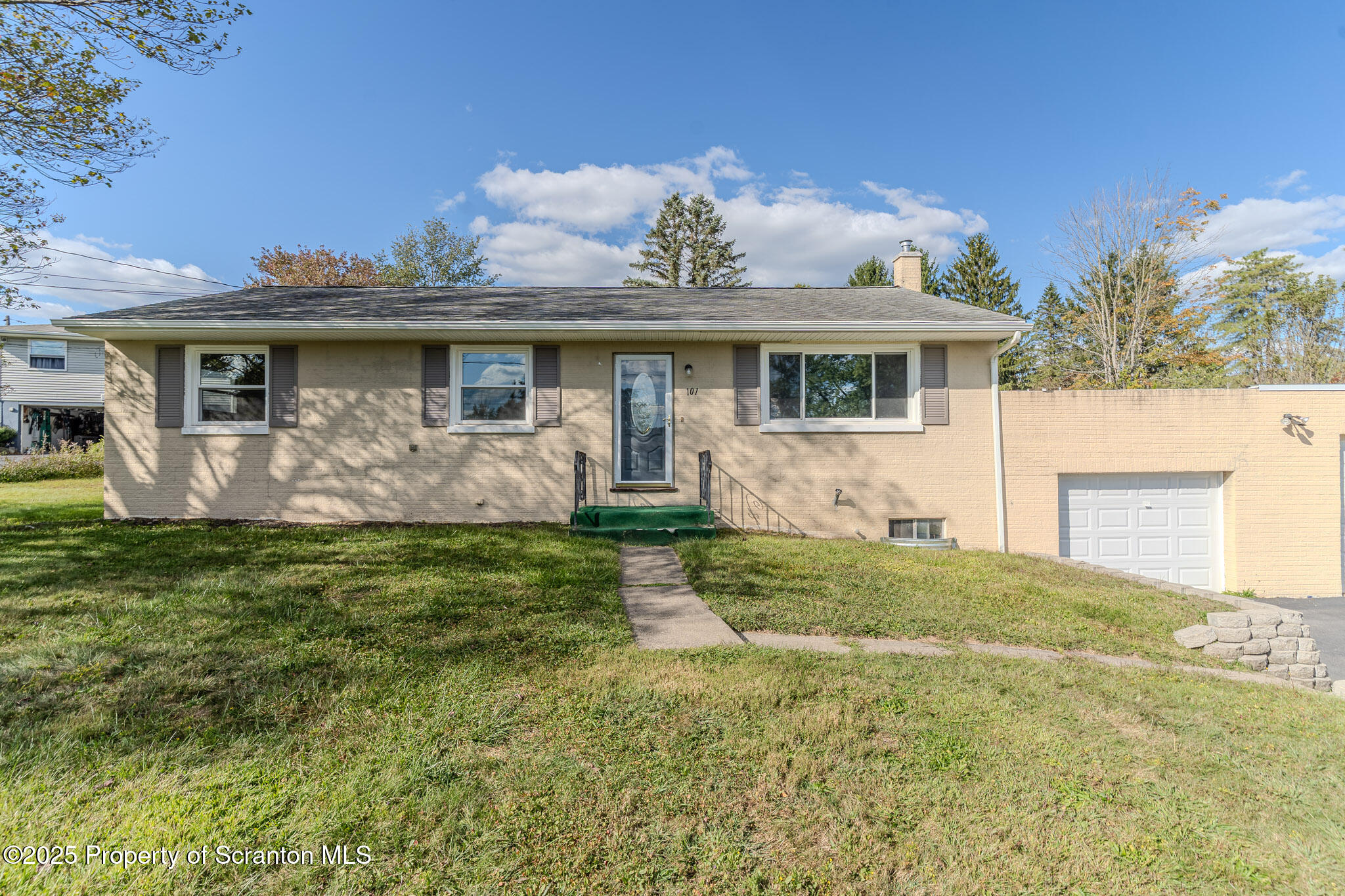 101 Sunset Road Dalton, PA 18414 - Photo 6 of 37 a front view of house with yard and green space