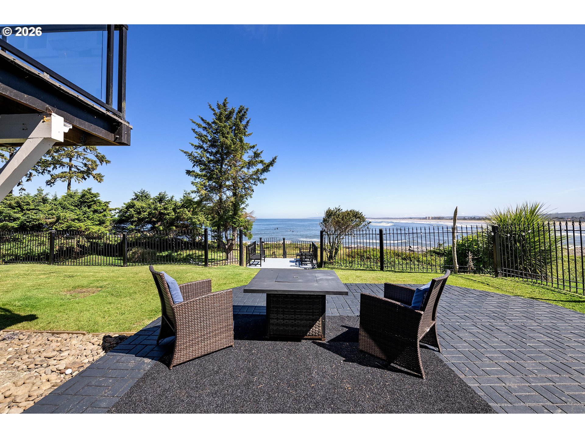 3232 Sunset Boulevard Seaside, OR 97138 - Photo 43 of 48 a view of a chairs and table in patio with a lake view