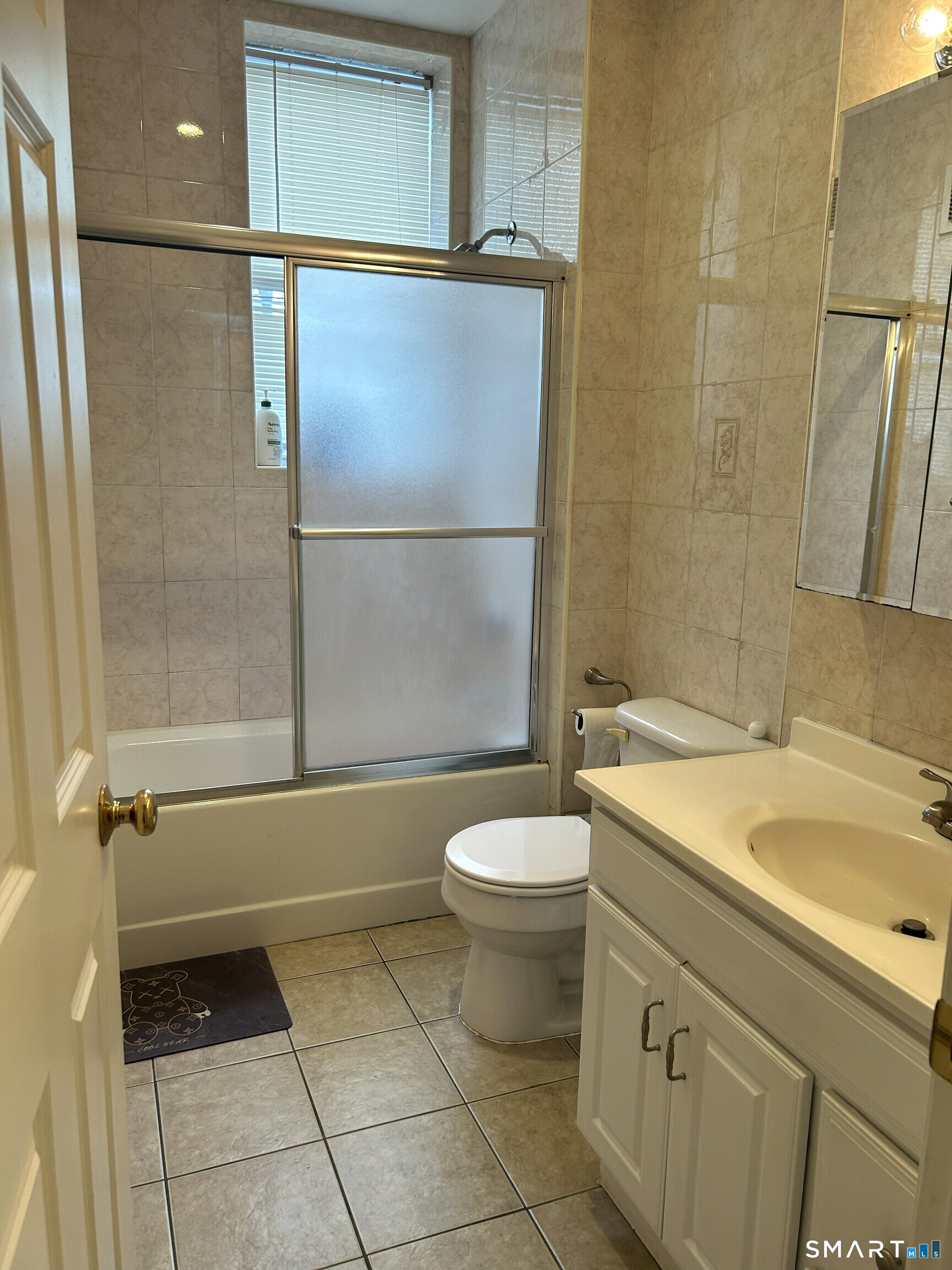 71-73 Whitney Avenue, Unit 3 New Haven, CT 06510 - Photo 4 of 4 a bathroom with a sink a toilet and shower