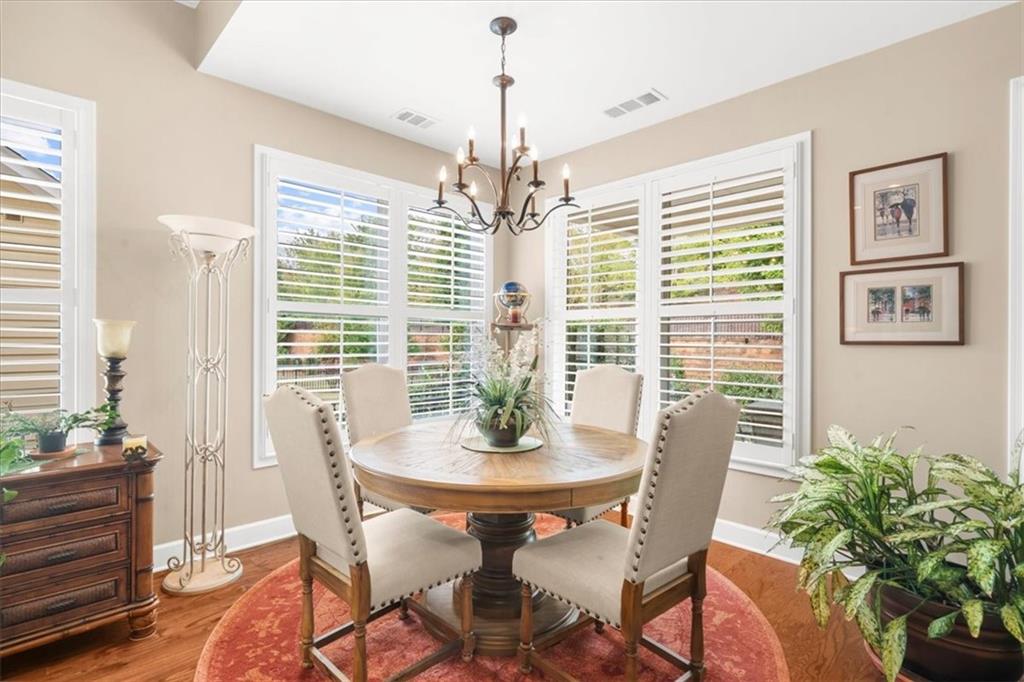 3880 Sweet Magnolia Drive Southwest Gainesville, GA 30504 - Photo 13 of 56 a view of a dining room with furniture window and outside view