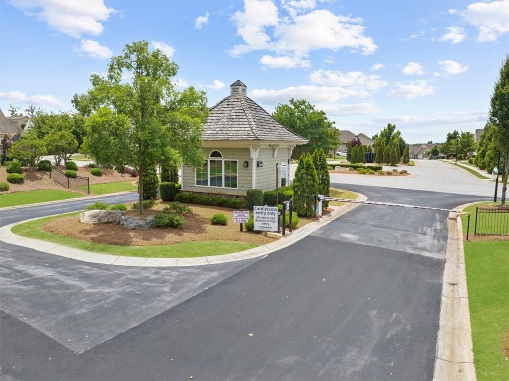 3880 Sweet Magnolia Drive Southwest Gainesville, GA 30504 - Photo 31 of 56 a view of a house with a backyard and a tree
