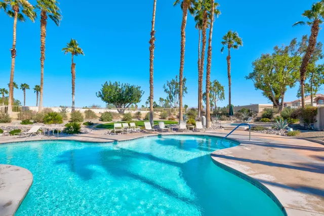 a view of a swimming pool and outdoor space